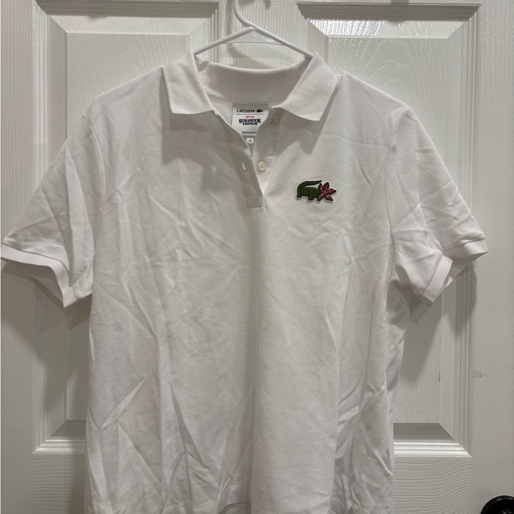 Lacoste x Strangers things French collaboration woman polo
